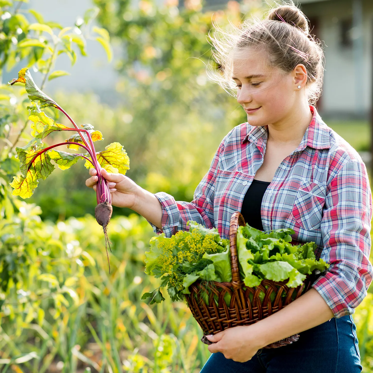 side-view-woman-picking-up-vegetables.jpg